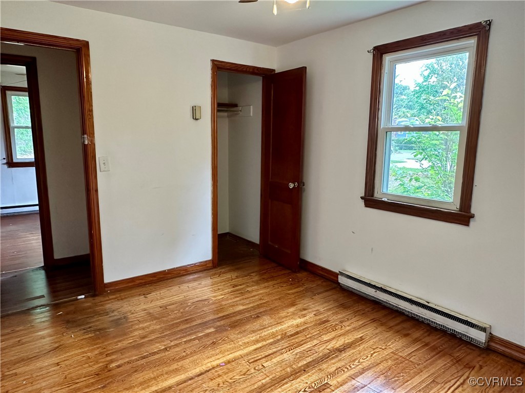 6001 Worthington Road Richmond, VA 23225 - Photo 13 of 23 Spare room featuring baseboards, light wood-style