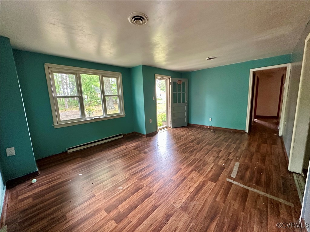 6001 Worthington Road Richmond, VA 23225 - Photo 3 of 23 Spare room featuring a baseboard heating unit, vis