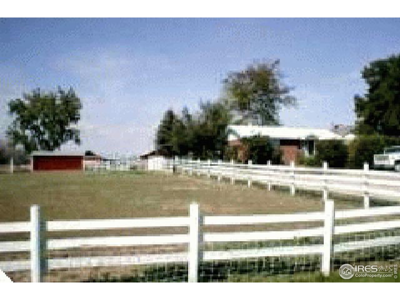 10117 East County Line Road Longmont, CO 80504 - Photo 1 of 4 a view of a house with a yard