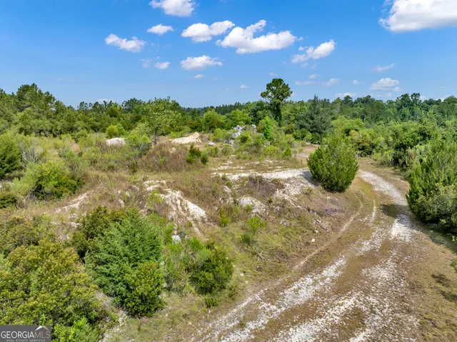 a view of a yard with an outdoor space and seating
