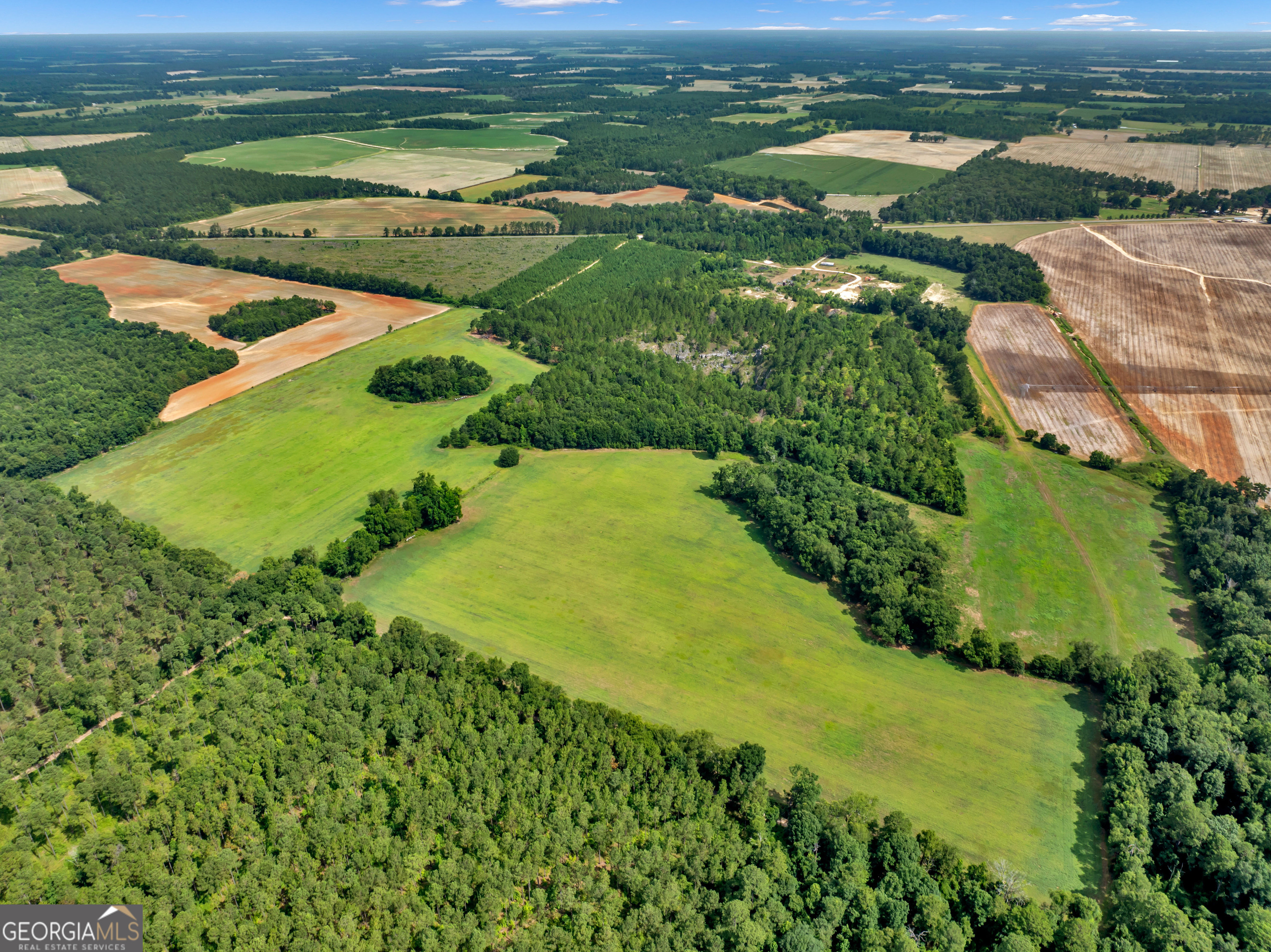 0 Harrell Road Whigham, GA 39897 - Photo 32 of 39 an aerial view of ocean with residential houses with outdoor space and trees