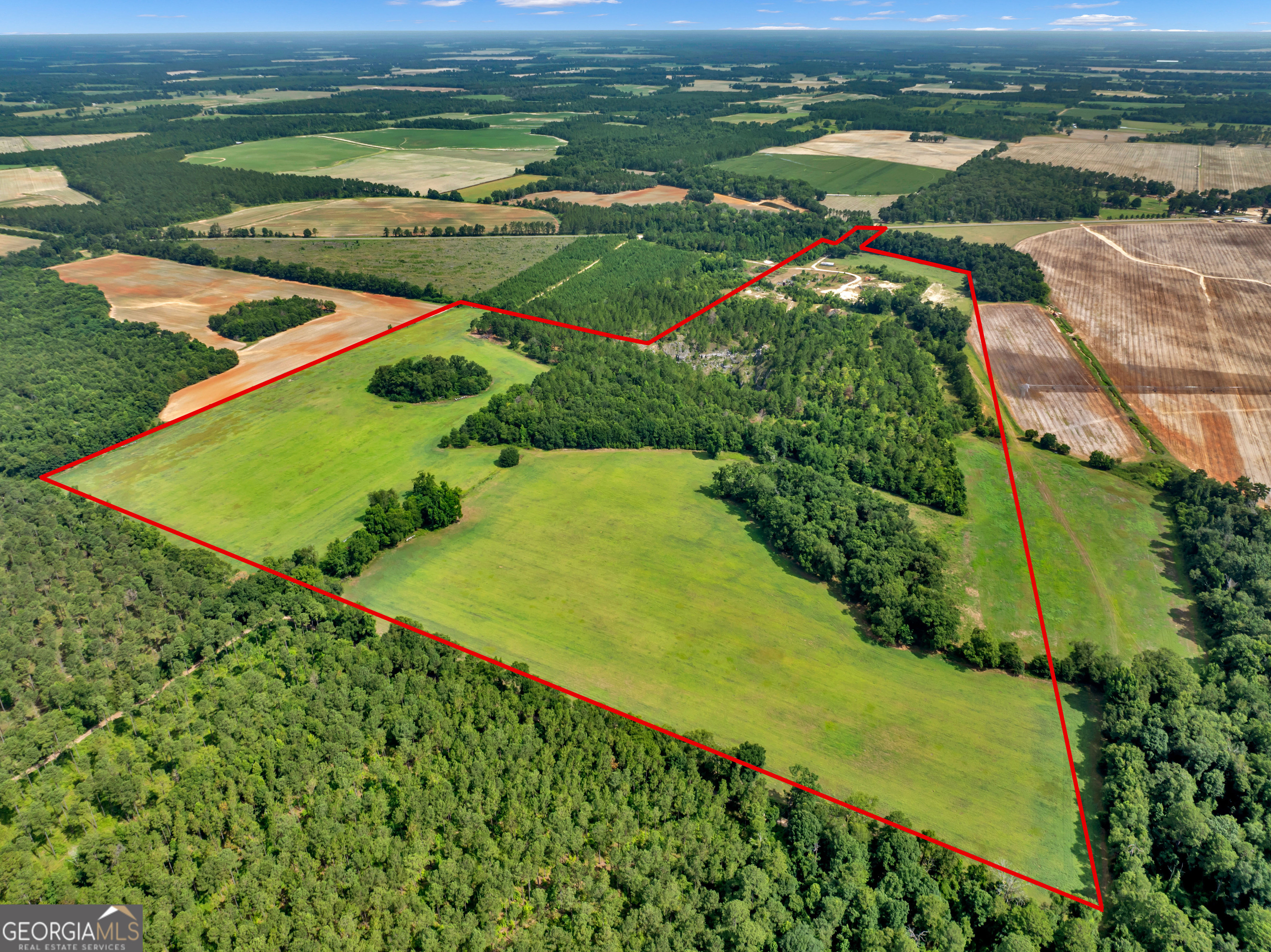 0 Harrell Road Whigham, GA 39897 - Photo 33 of 39 an aerial view of a golf course with a yard