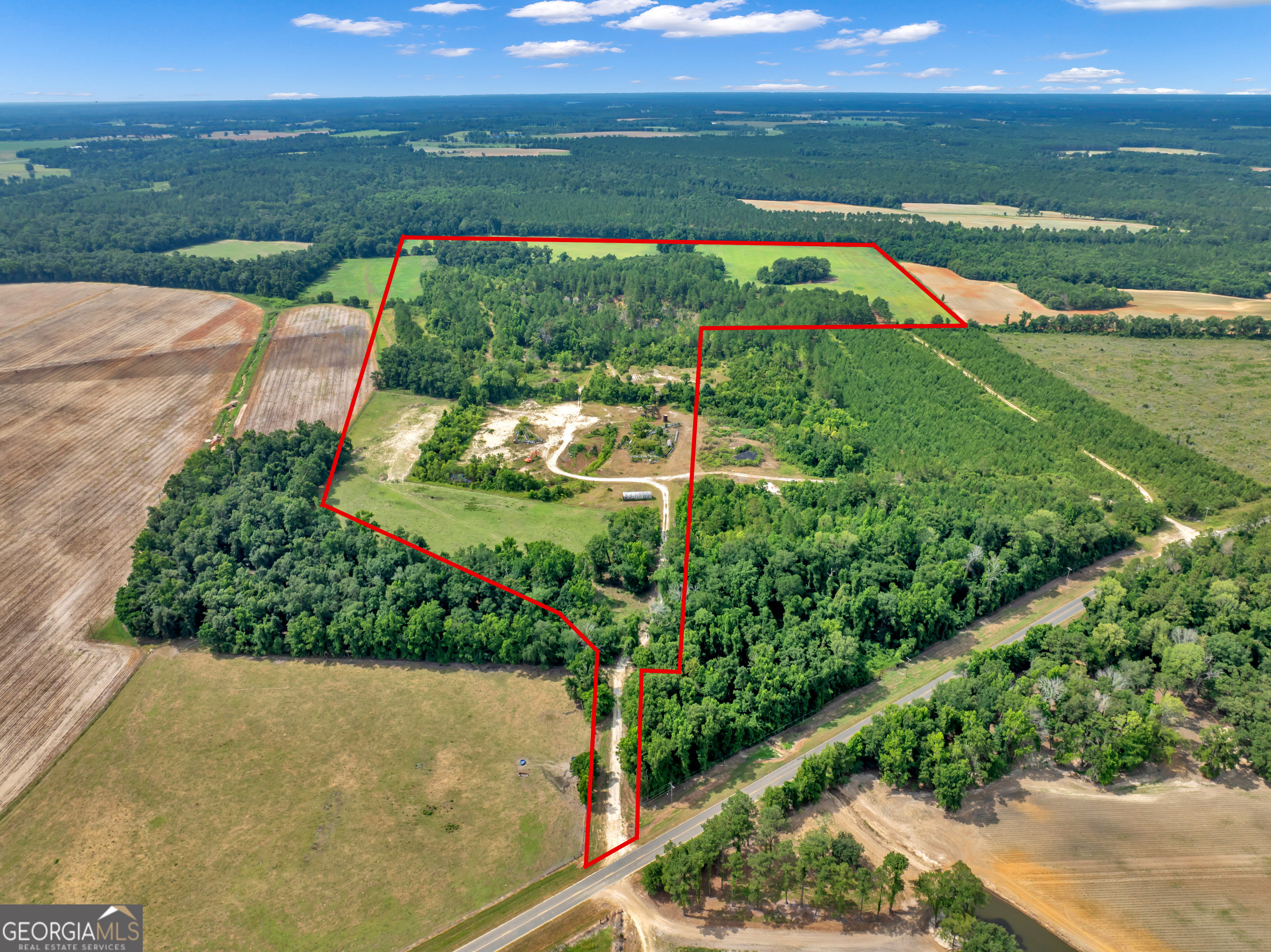 0 Harrell Road Whigham, GA 39897 - Photo 4 of 39 a view of lake with huge green field