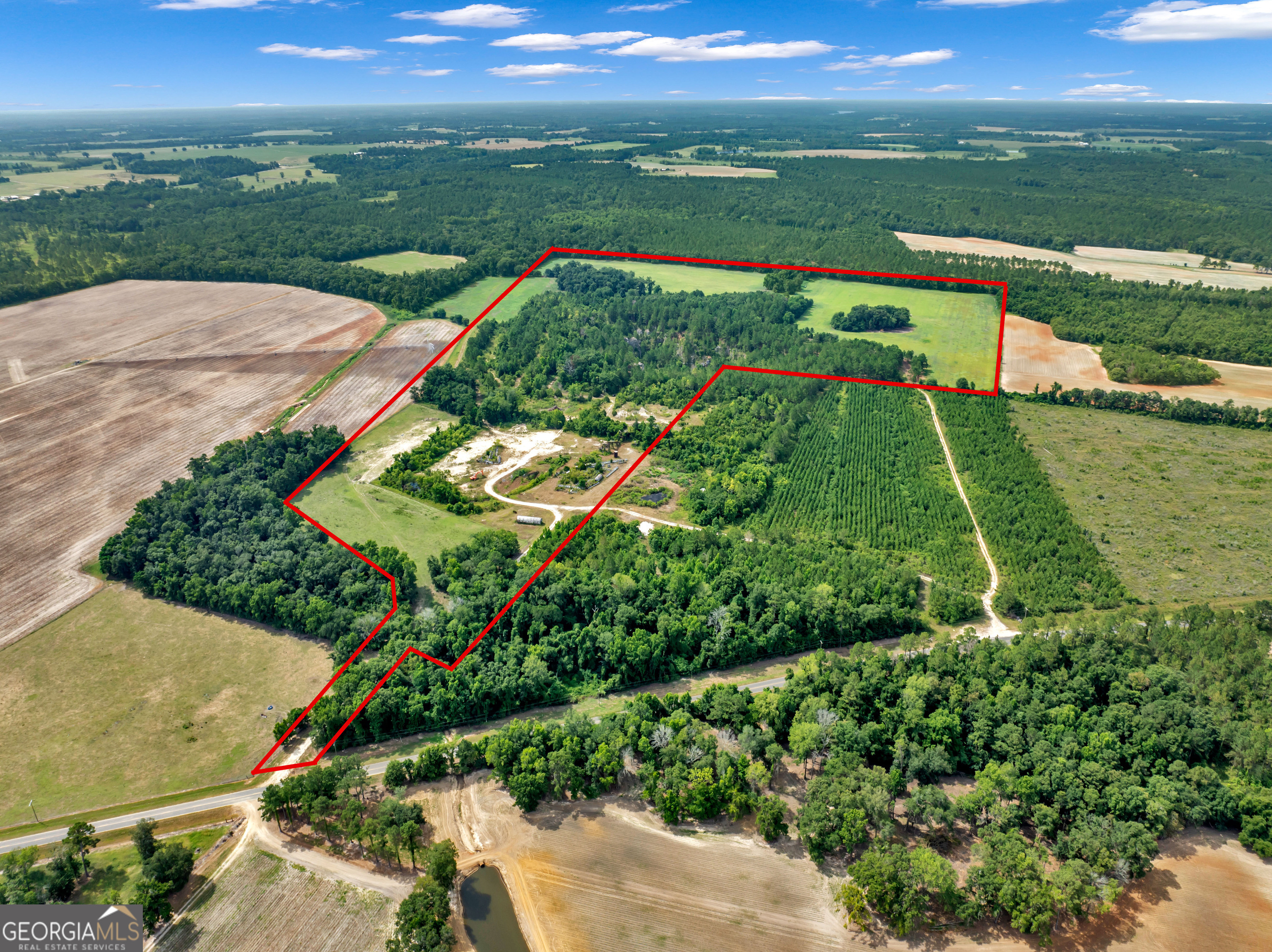 0 Harrell Road Whigham, GA 39897 - Photo 6 of 39 an aerial view of river residential houses with outdoor space and swimming pool