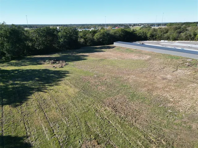 a view of a swimming pool and an outdoor seating