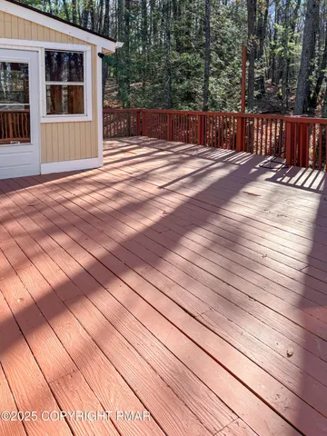 a view of backyard with deck