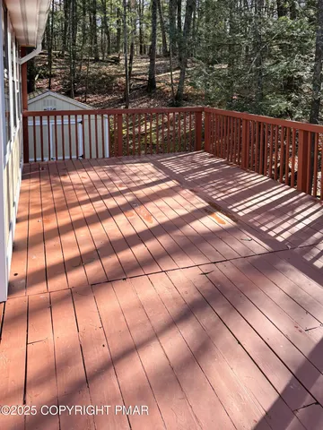 a view of a brick building with many windows