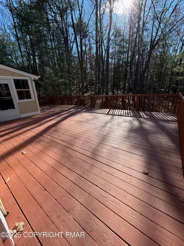 a view of a yard with an outdoor space