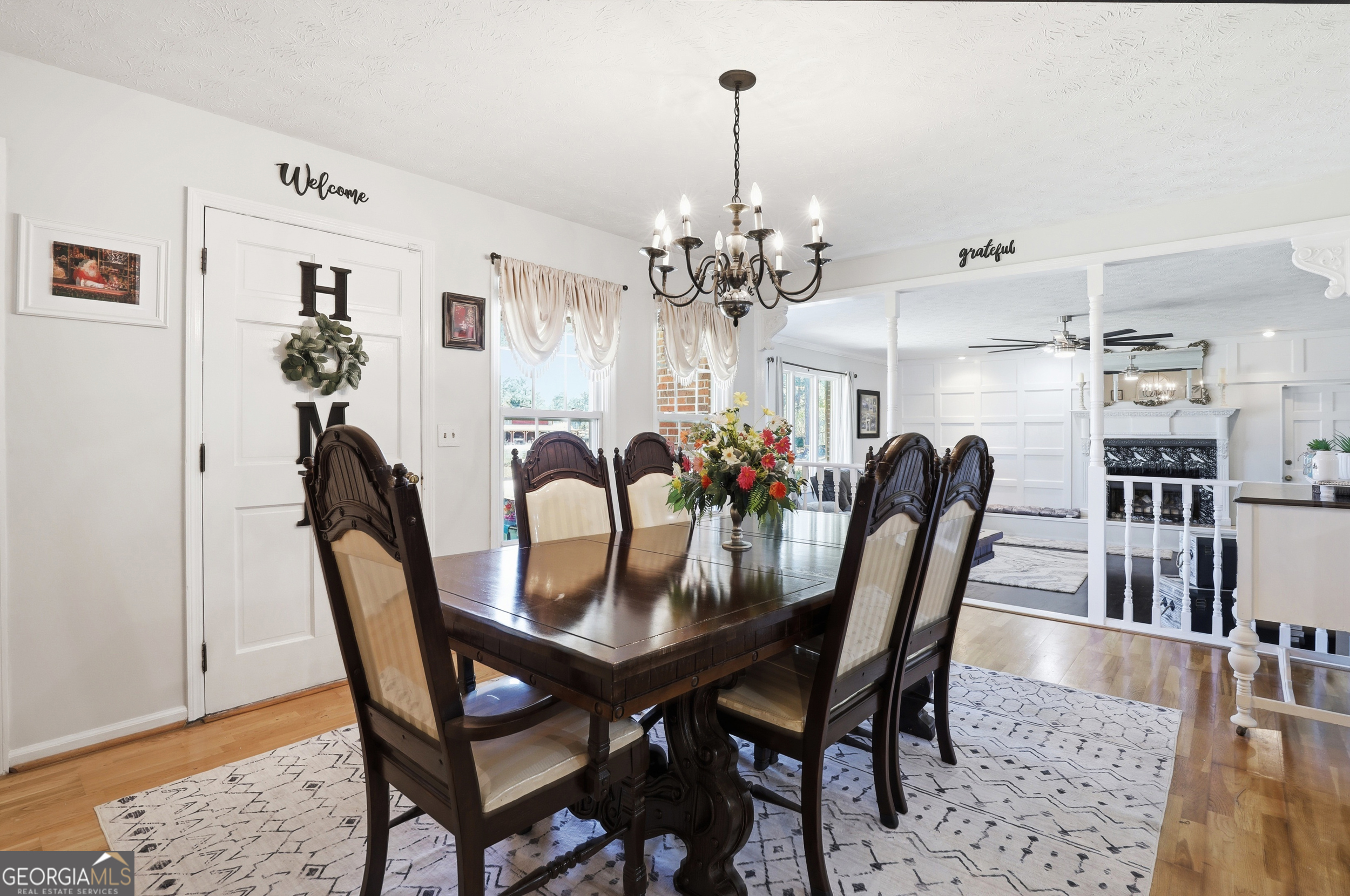 333 Rainbow Ridge Swainsboro, GA 30401 - Photo 11 of 46 a view of a dining room with furniture and wooden floor