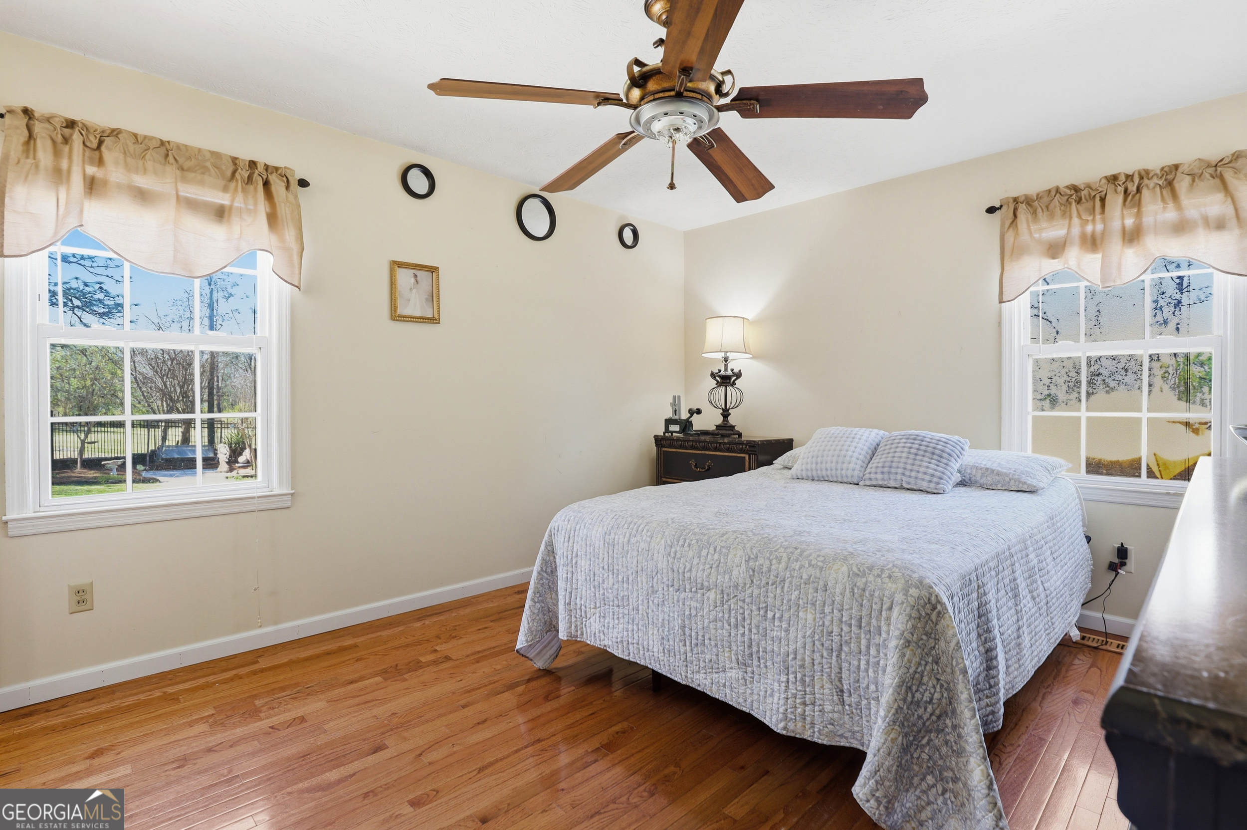 333 Rainbow Ridge Swainsboro, GA 30401 - Photo 18 of 46 a bedroom with a bed and a window