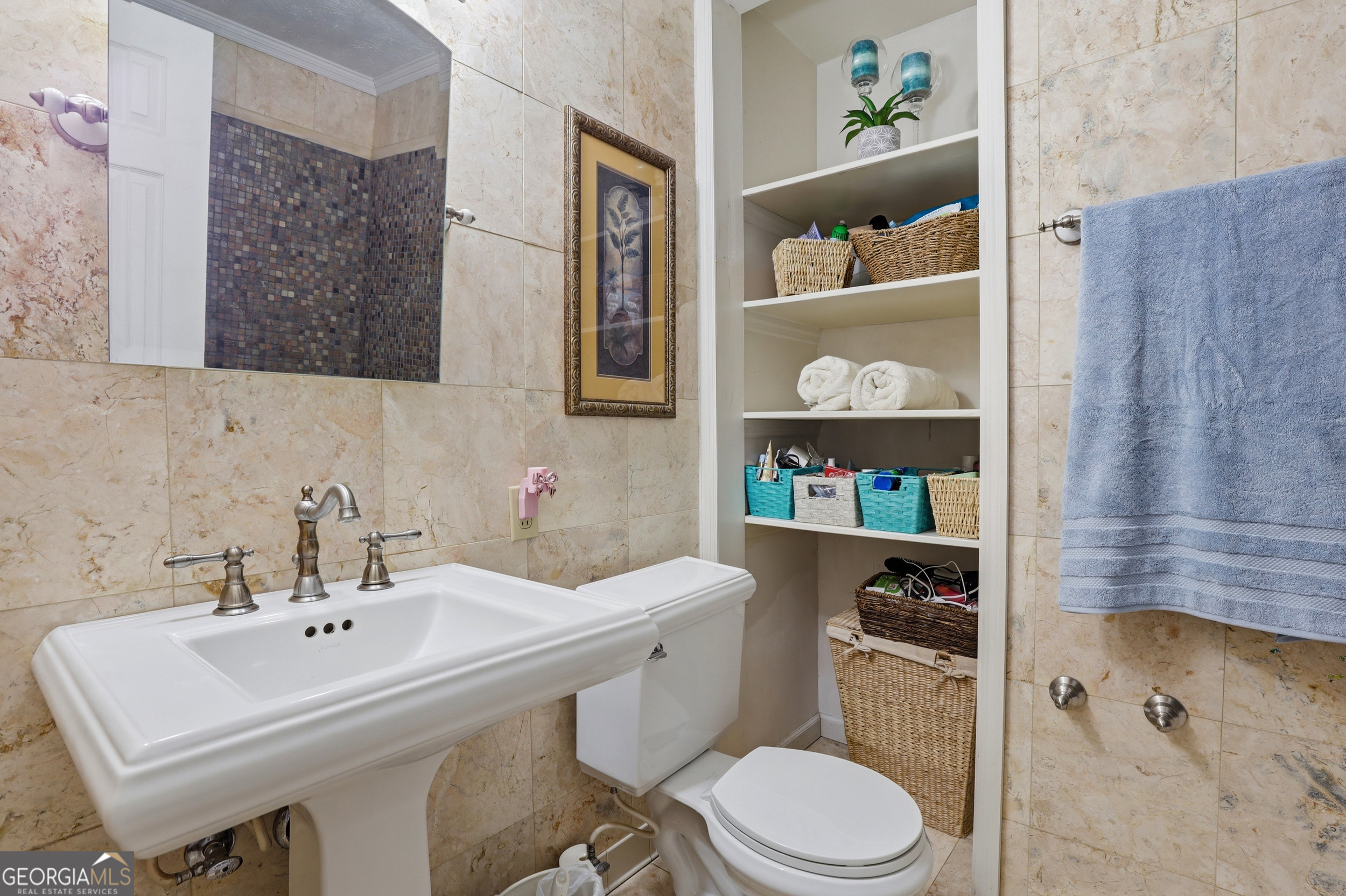 333 Rainbow Ridge Swainsboro, GA 30401 - Photo 21 of 46 a bathroom with a sink a toilet and shower