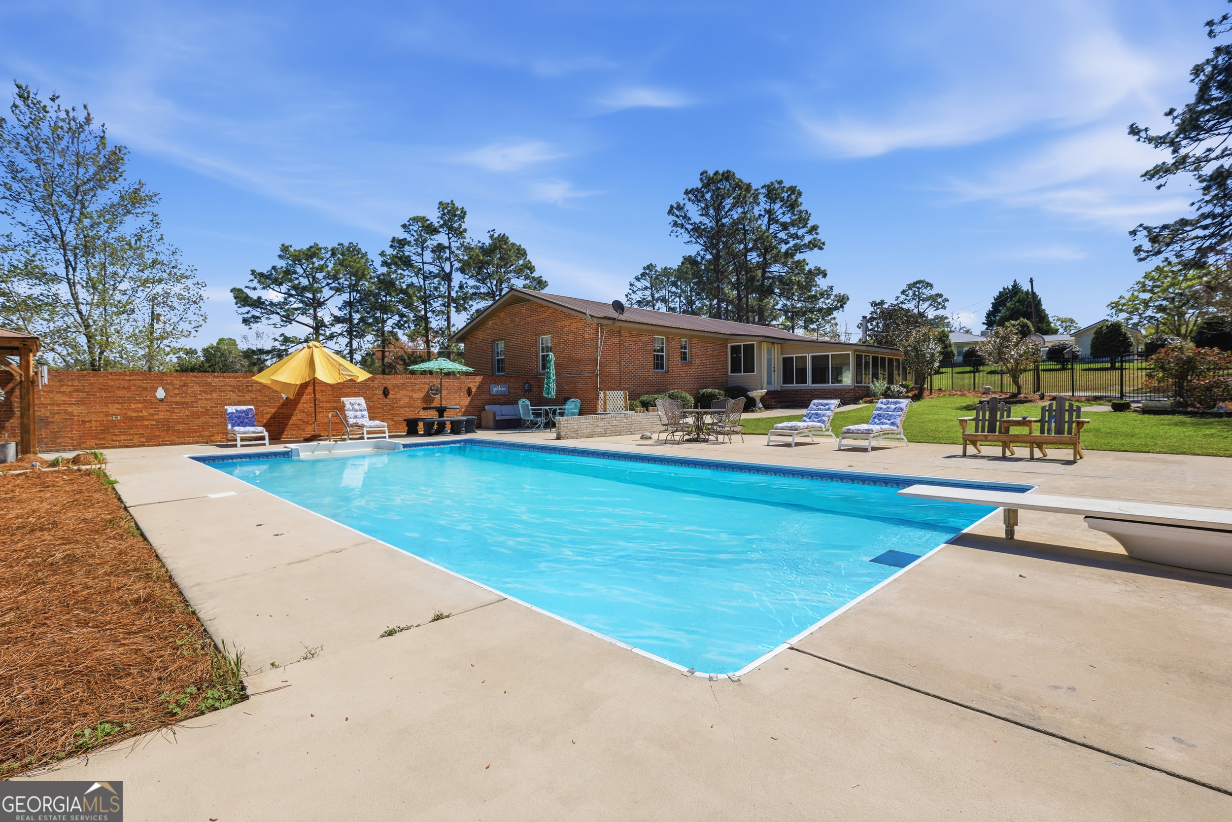 333 Rainbow Ridge Swainsboro, GA 30401 - Photo 28 of 46 swimming pool view with a outdoor space