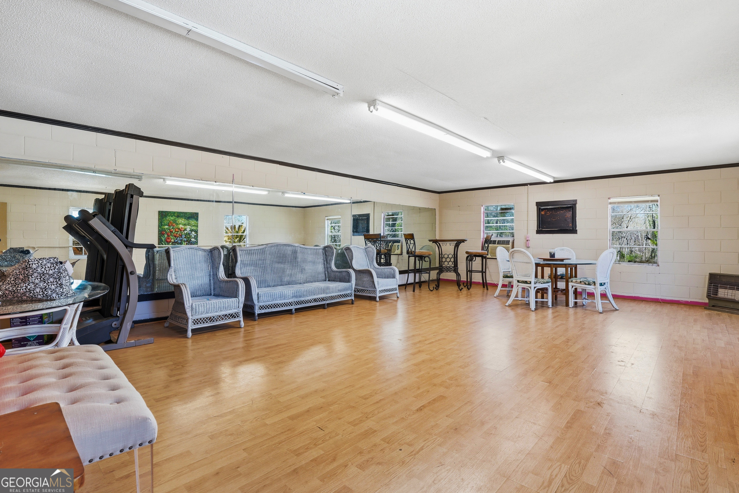 333 Rainbow Ridge Swainsboro, GA 30401 - Photo 31 of 46 a living room with furniture and a wooden floor