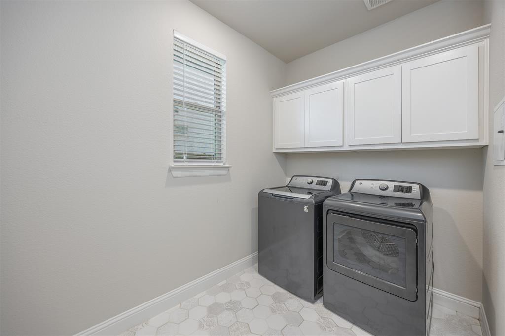 15688 Tea Tree Road Frisco, TX 75033 - Photo 14 of 39 Expansive laundry room with space for an extra fridge, folding table or ironing board