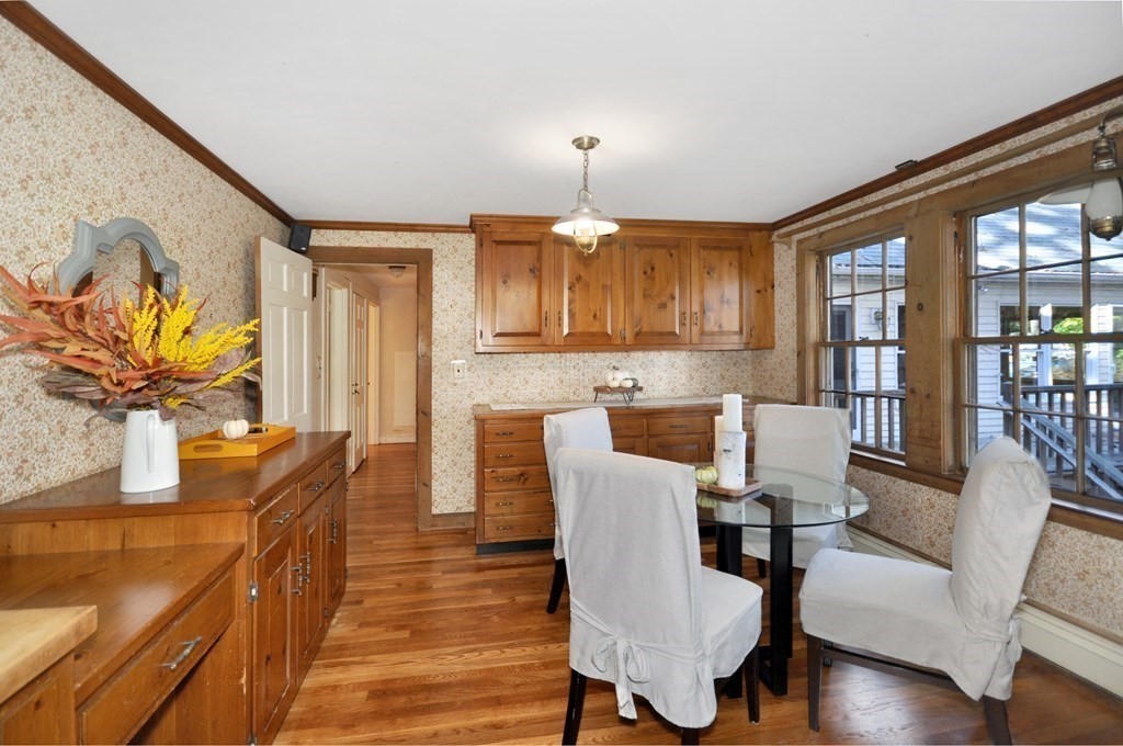 46 Concord Road Acton, MA 01720 - Photo 12 of 33 a view of a dining room with furniture window and wooden floor
