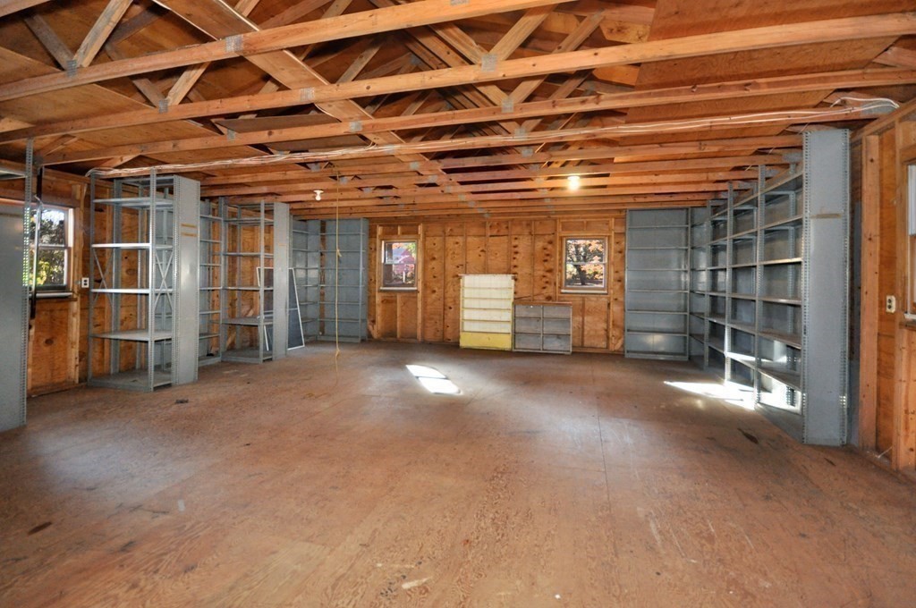 46 Concord Road Acton, MA 01720 - Photo 26 of 33 a view of empty room with wooden shelves