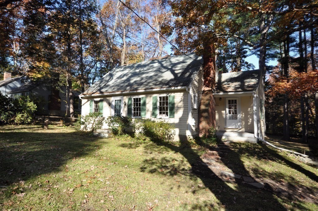 46 Concord Road Acton, MA 01720 - Photo 28 of 33 a front view of a house with a yard