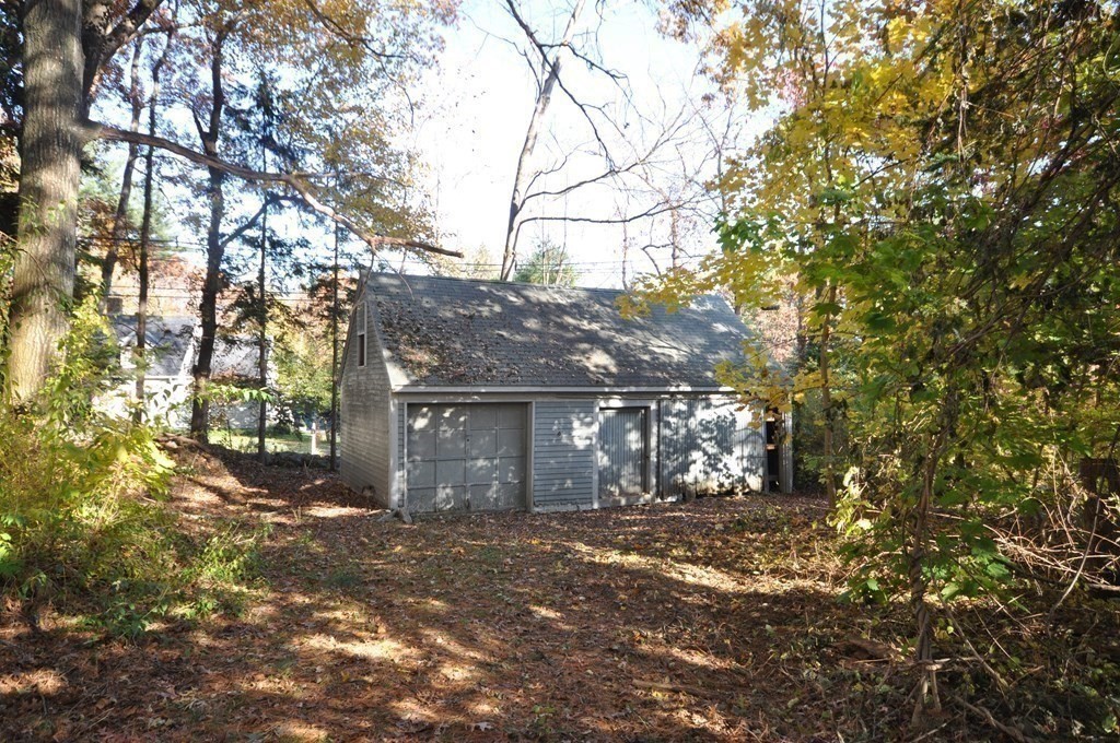 46 Concord Road Acton, MA 01720 - Photo 4 of 33 a view of house with a tree
