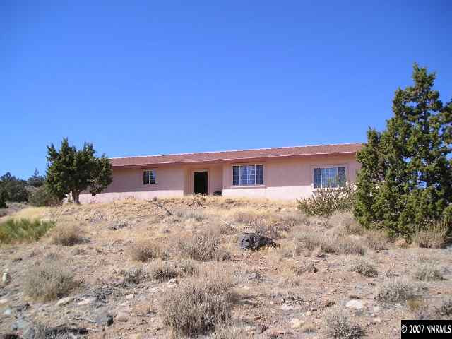 14020 North Red Rock Road Reno, NV 89508 - Photo 1 of 9 a house view with a backyard space