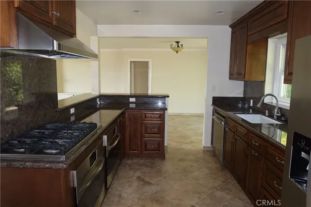 an empty room with wooden floor