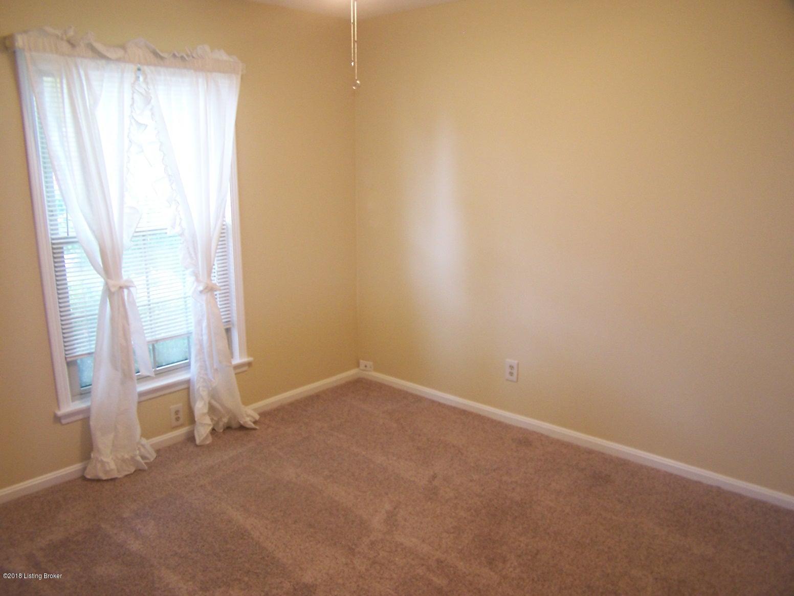 11004 Torrington Road Louisville, KY 40272 - Photo 33 of 43 Bedroom #1 with new carpeting, new paint and a new Ceiling Fan/Light Fixture