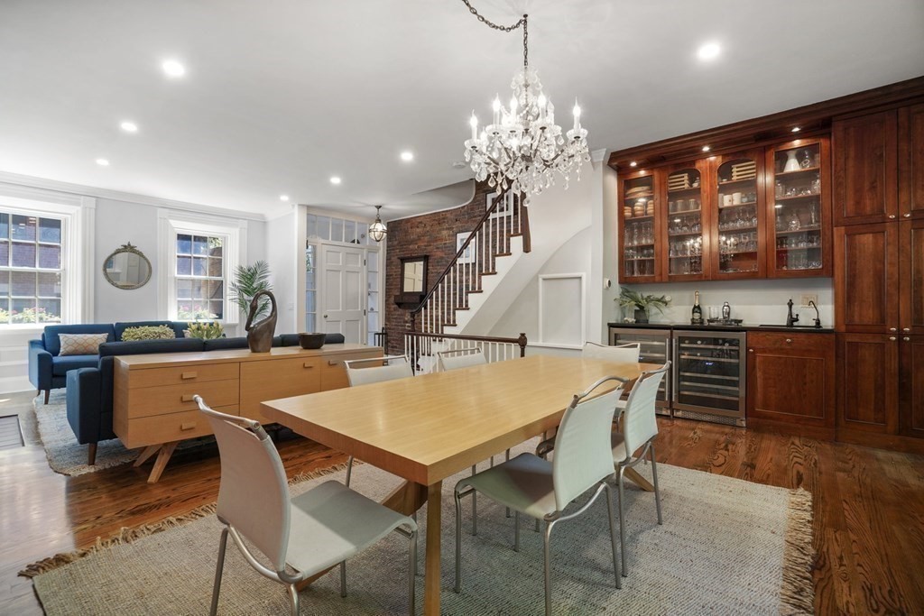 6 Strong Place Boston, MA 02114 - Photo 11 of 38 a view of a dining room with furniture window and wooden floor