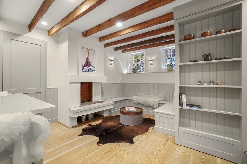 6 Strong Place Boston, MA 02114 - Photo 18 of 38 a view of a bedroom with baby bed and hanging chair