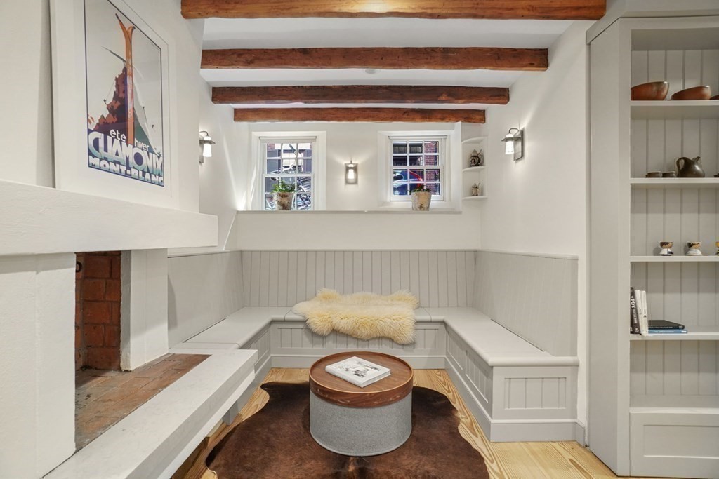 6 Strong Place Boston, MA 02114 - Photo 20 of 38 a bathroom with a toilet a sink and a shower