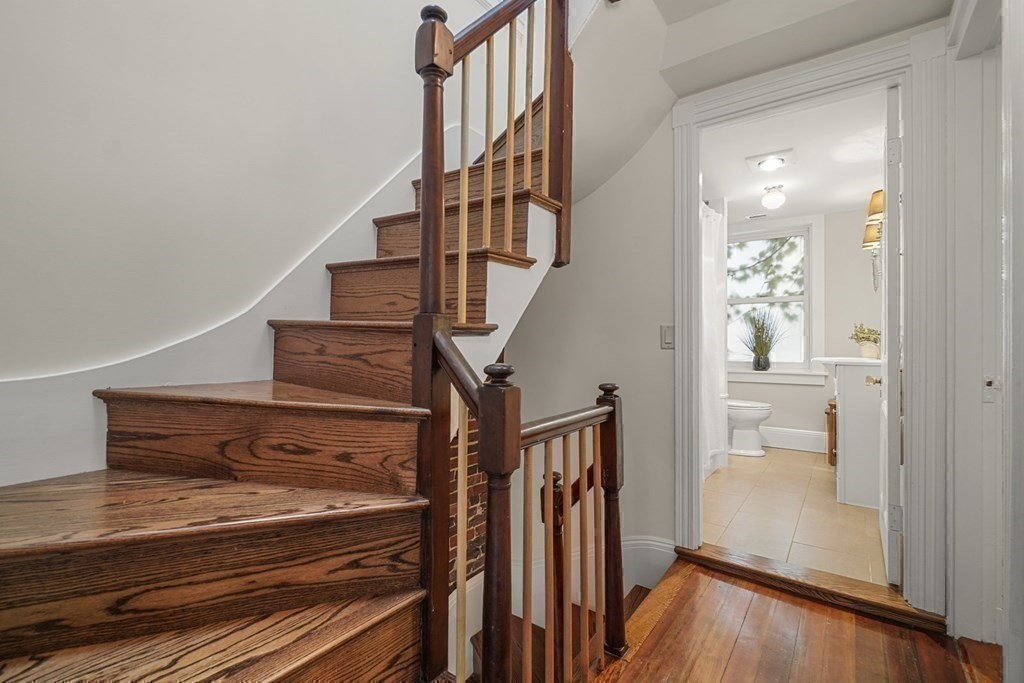 6 Strong Place Boston, MA 02114 - Photo 31 of 38 a view of entryway and hall with wooden floor