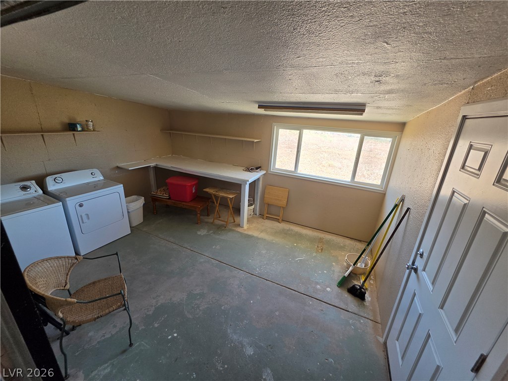 2930 Frehner Ranch Road Pioche, NV 89043 - Photo 26 of 39 Functional laundry space includes a full-size washer and dryer, ready for your needs.