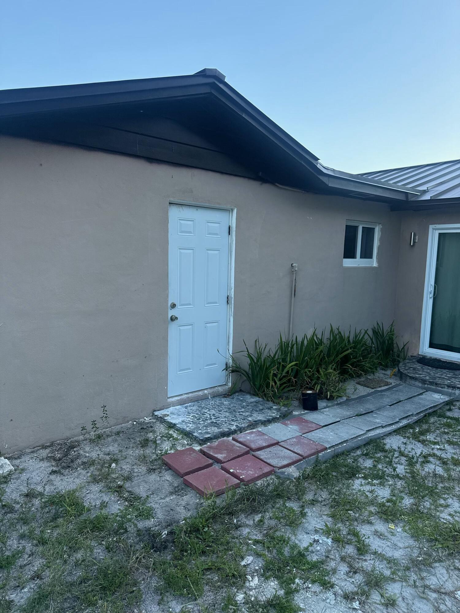 1244 West 27th Street West Palm Beach, FL 33404 - Photo 1 of 8 Front