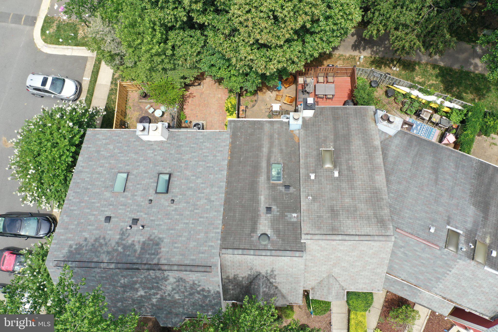 2121 Whisper Way Reston, VA 20191 - Photo 49 of 61 Charming rooftops amidst lush greenery.