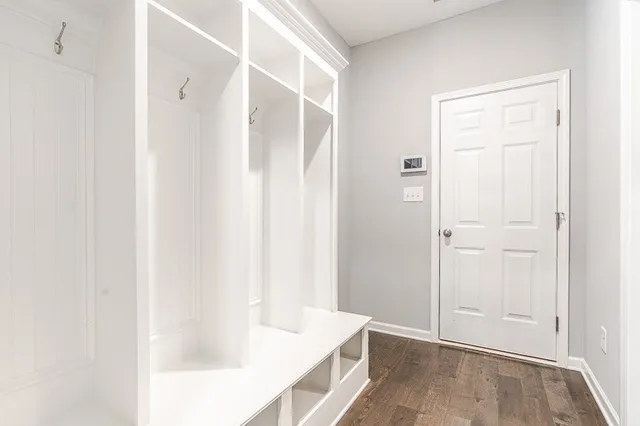 a bathroom with a tub and shower