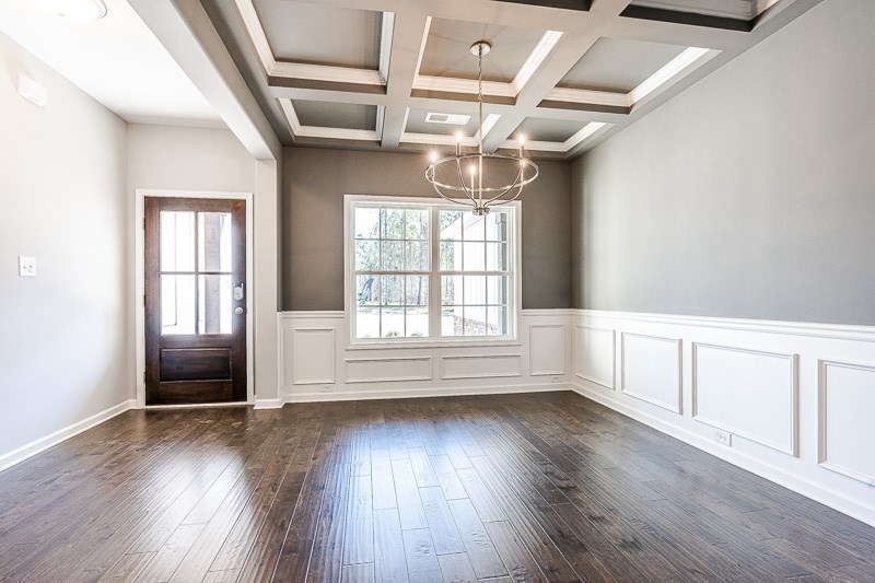 32 Maple Lakes Drive Cataula, GA 31804 - Photo 2 of 27 an empty room with wooden floor and windows