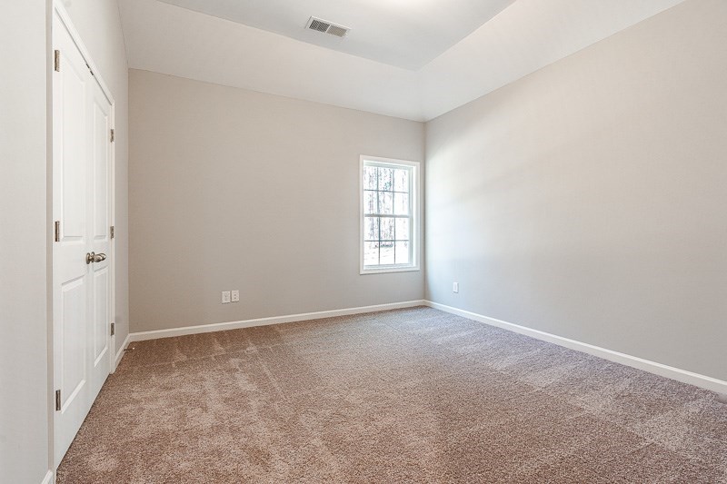 32 Maple Lakes Drive Cataula, GA 31804 - Photo 22 of 27 an empty room with windows