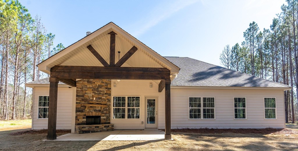 32 Maple Lakes Drive Cataula, GA 31804 - Photo 24 of 27 a front view of a house with a yard