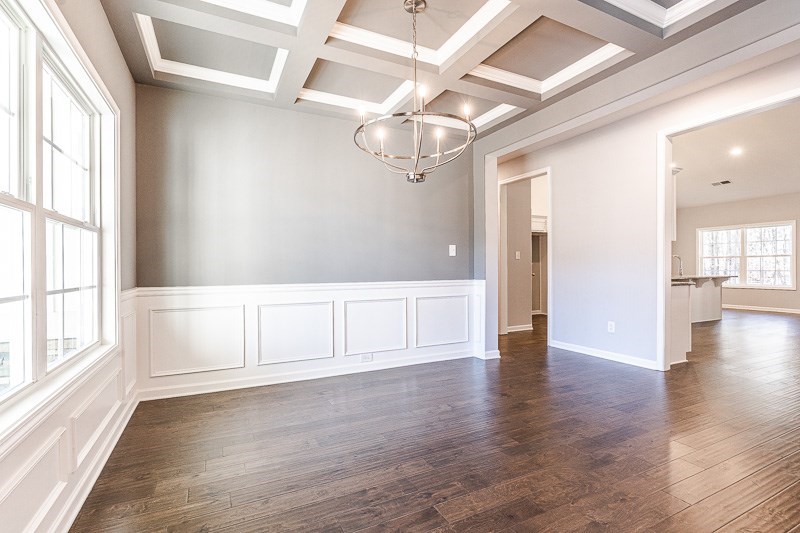 32 Maple Lakes Drive Cataula, GA 31804 - Photo 5 of 27 a view of an empty room with wooden floor and a window