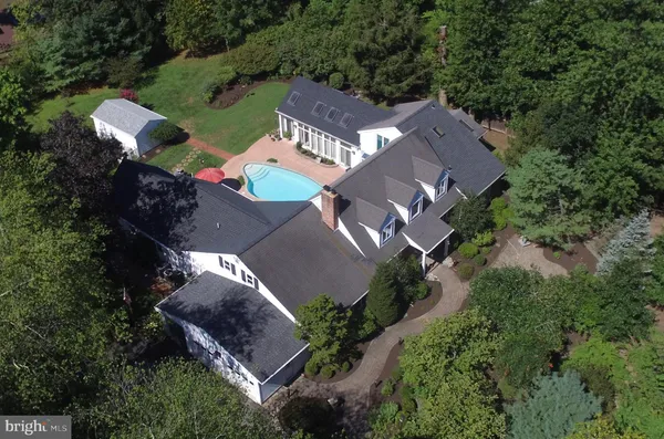 an aerial view of a house with a garden
