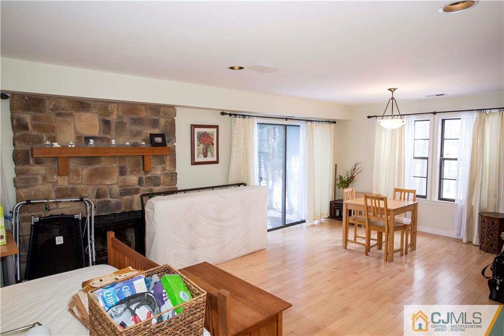 3806 Springbrook Drive Edison, NJ 08820 - Photo 19 of 22 a living room with furniture and a wooden floor