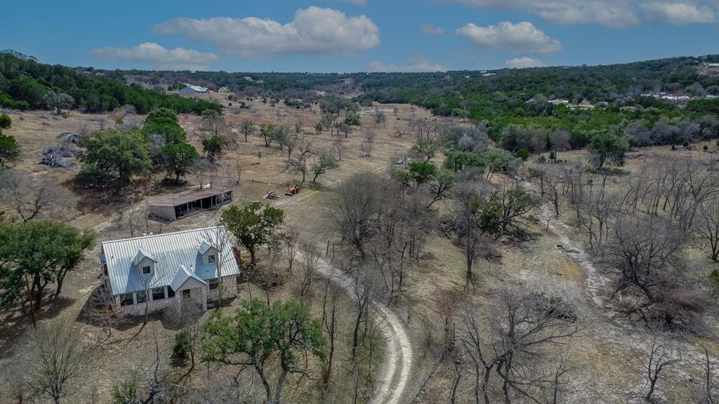 an aerial view of residential house with outdoor space