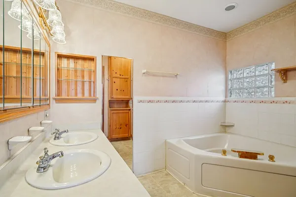 a bathroom with a sink and a bathtub