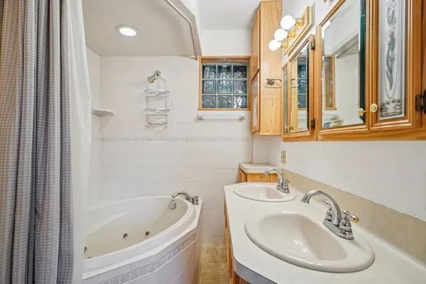 a bathroom with a sink and a bathtub