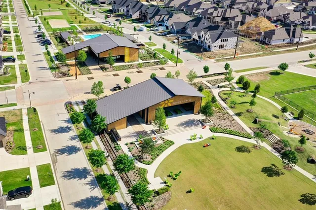 a aerial view of a house with swimming pool