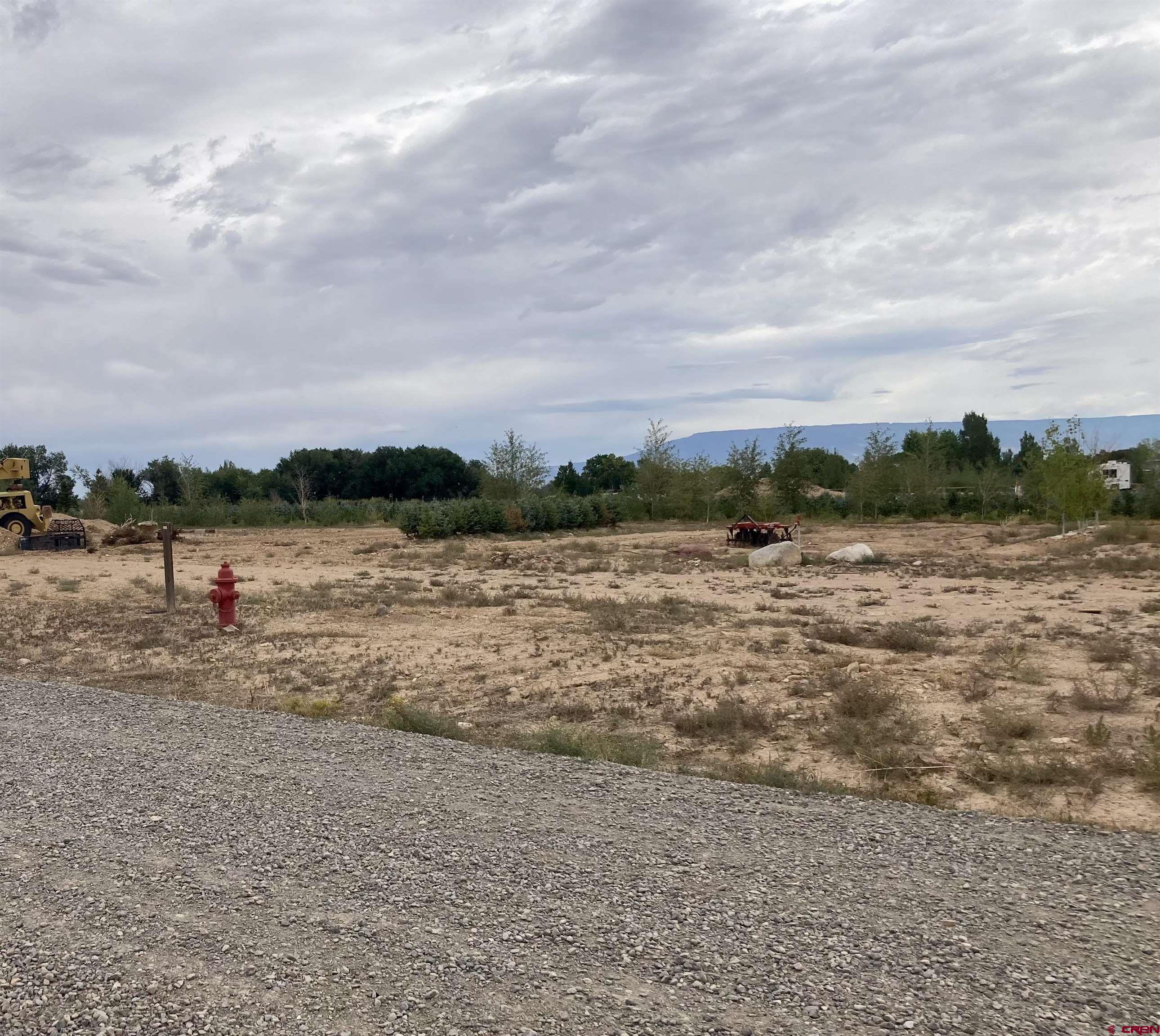Lot 14 Fredonia Road Olathe, CO 81425 - Photo 11 of 11 a view of lake view with houses in background