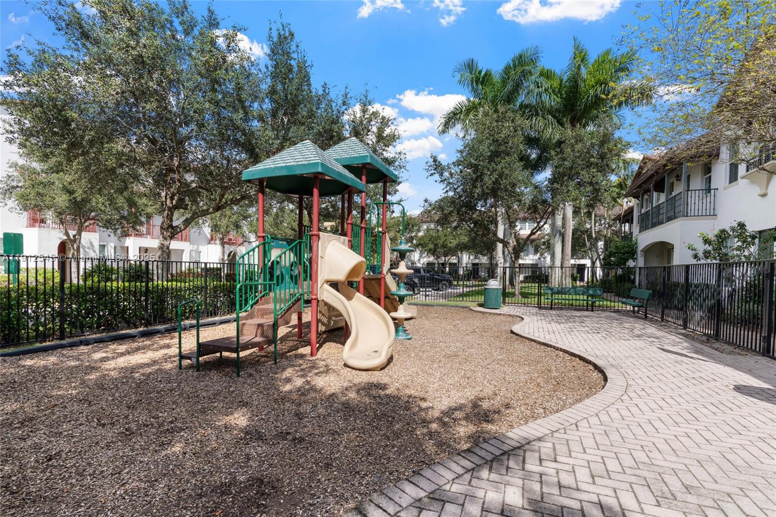 2565 Southwest 119th Terrace Miramar, FL 33025 - Photo 31 of 37 a view of a park with swings and slides