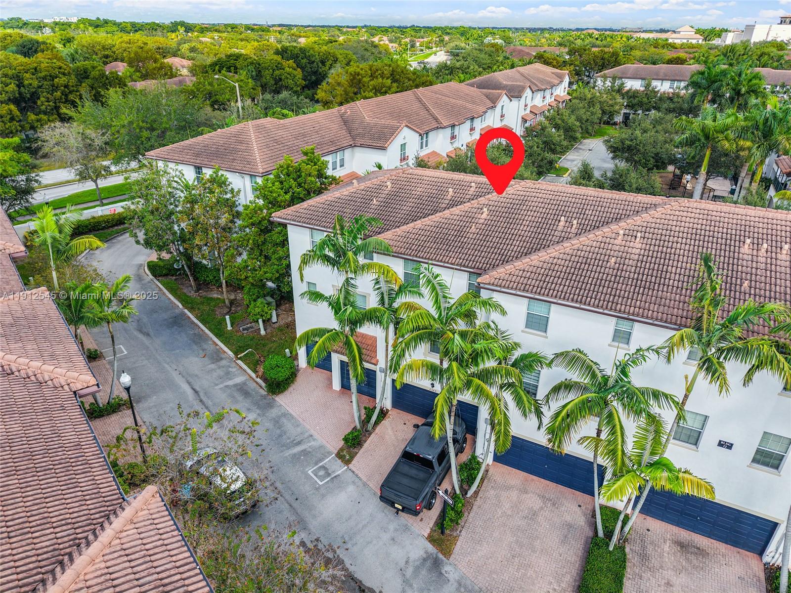 2565 Southwest 119th Terrace Miramar, FL 33025 - Photo 33 of 37 an outdoor space with furniture and garden view
