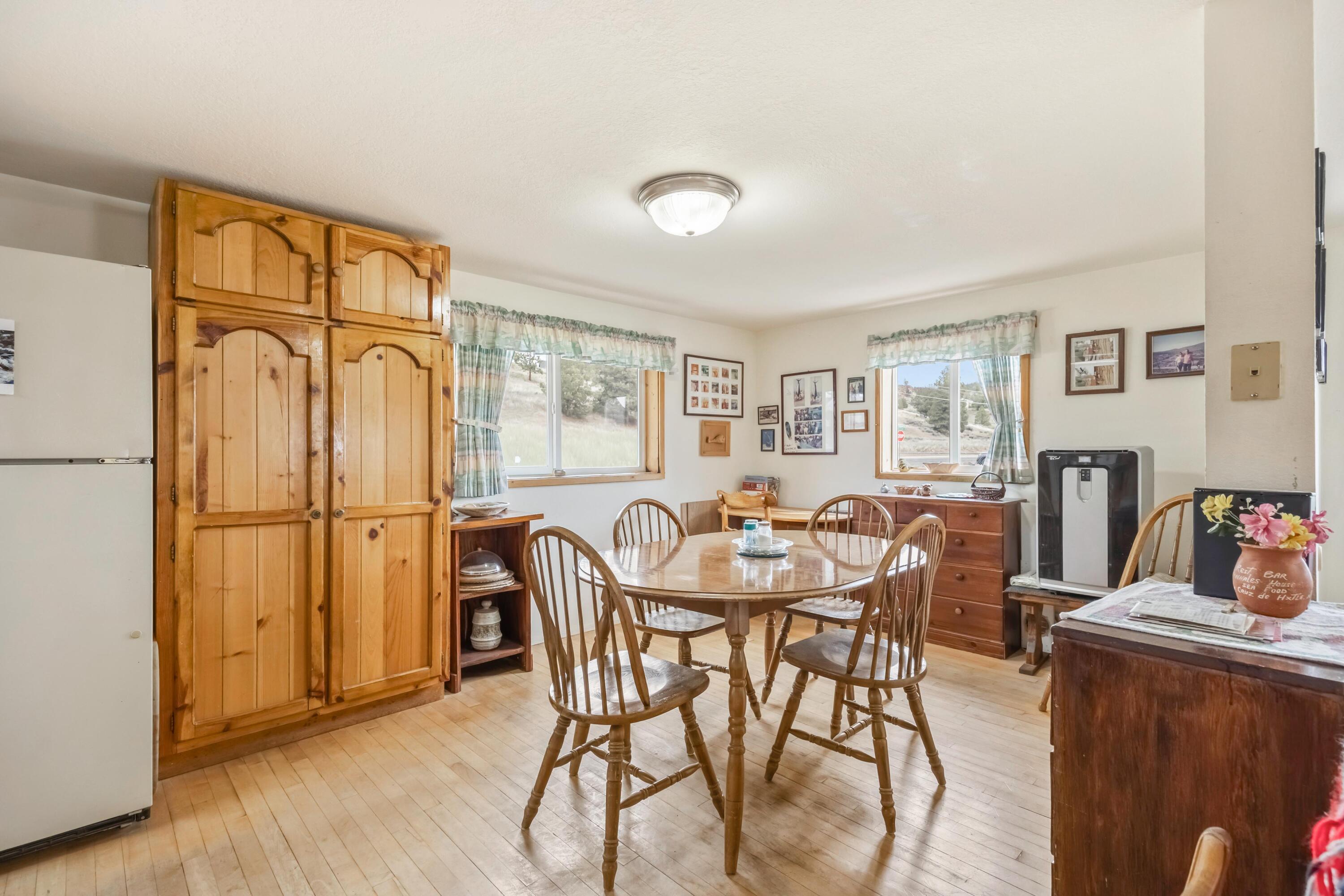 2010 Northeast Laughlin Road Prineville, OR 97754 - Photo 10 of 39 a view of a dining room with furniture and a window