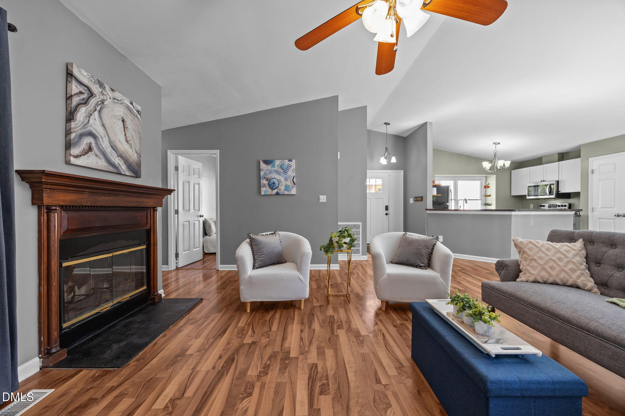 440 Dickens Drive Raleigh, NC 27610 - Photo 1 of 18 a living room with furniture and a fireplace