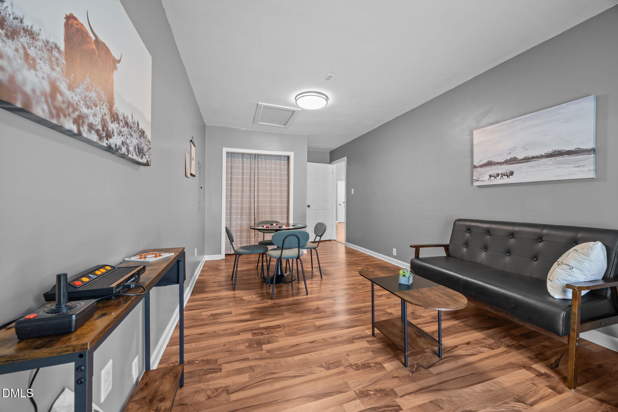 440 Dickens Drive Raleigh, NC 27610 - Photo 11 of 18 a living room with furniture and wooden floor