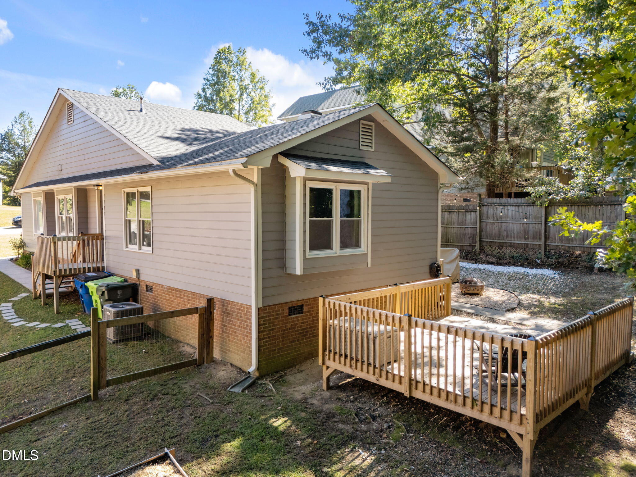 440 Dickens Drive Raleigh, NC 27610 - Photo 17 of 18 a front view of house with yard outdoor seating and barbeque oven